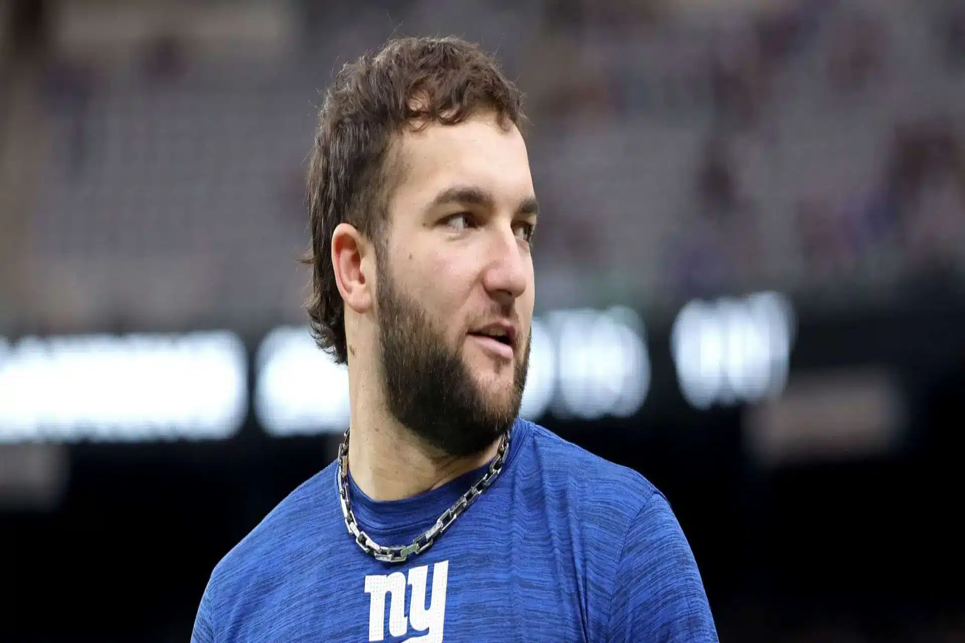 Quincy Avery Slams Giants RB Cam Skattebo Over Fanatics Fest Backflip