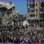 Gaza Holds Mass Funeral for 112 Family Members Recovered from Rubble